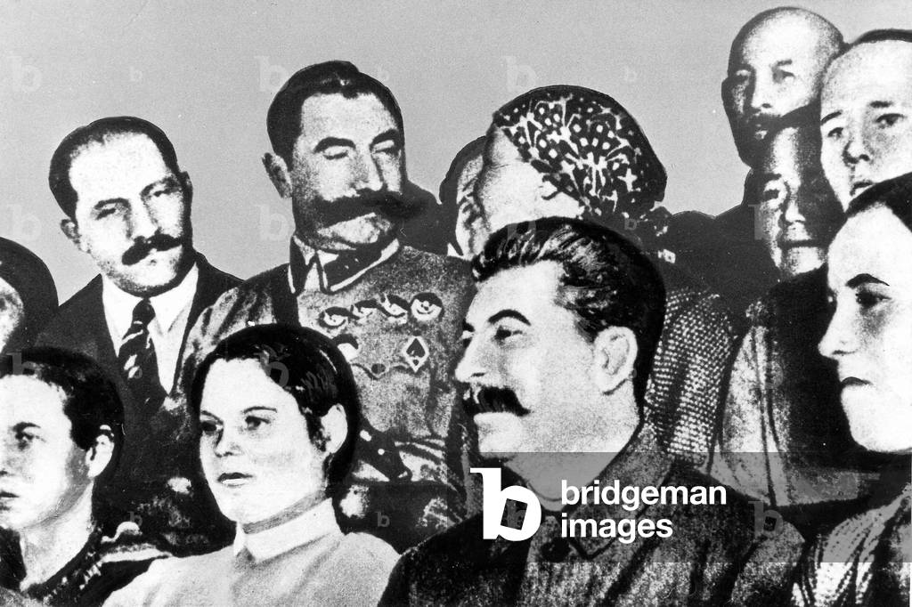 Josef Stalin in the circle of kolkhoz workers, 1935