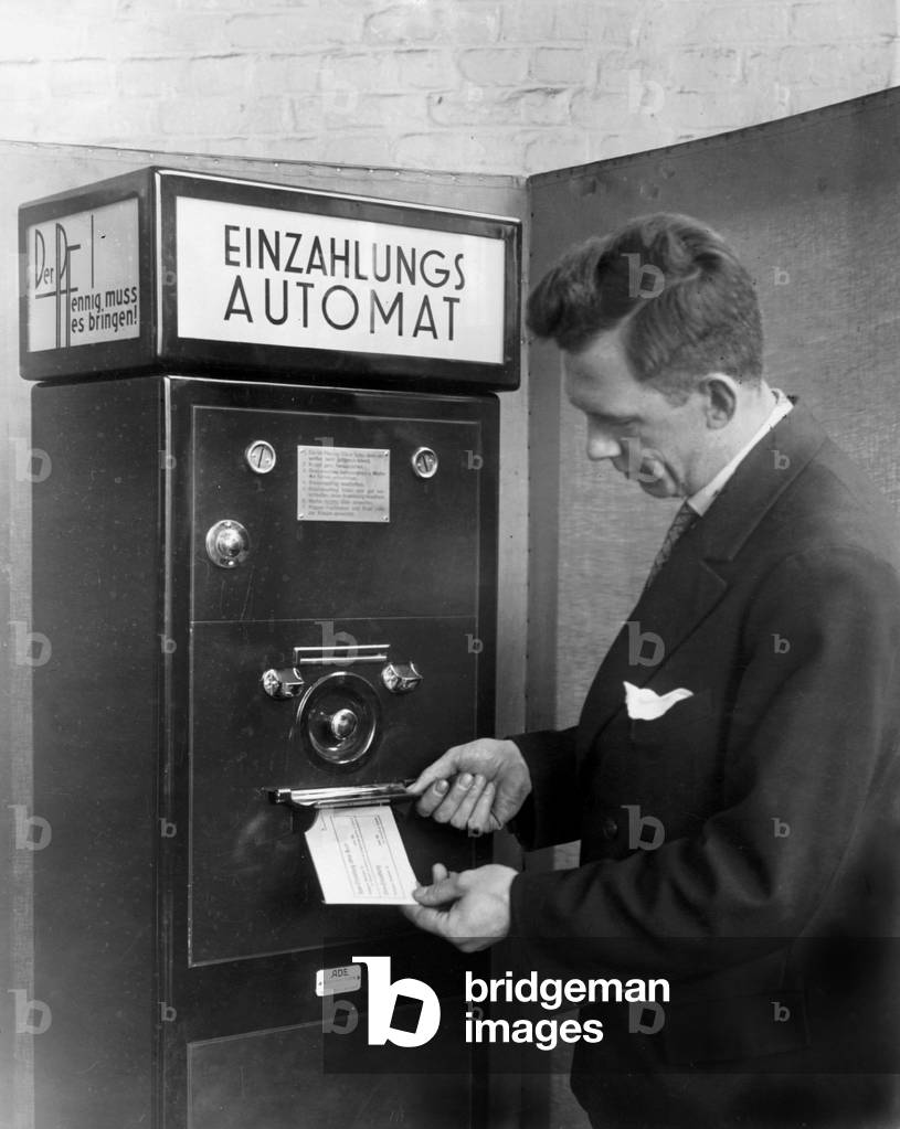 Bank deposit machine, 1931 (b/w photo)