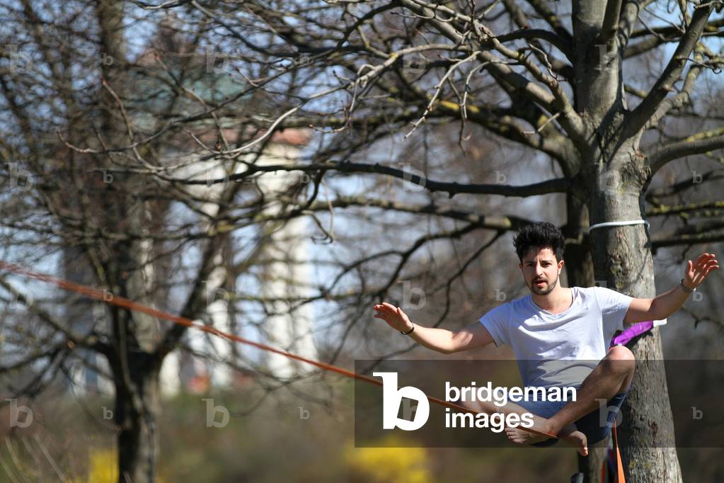 Slackliner in the English Garden in Munich, 2014