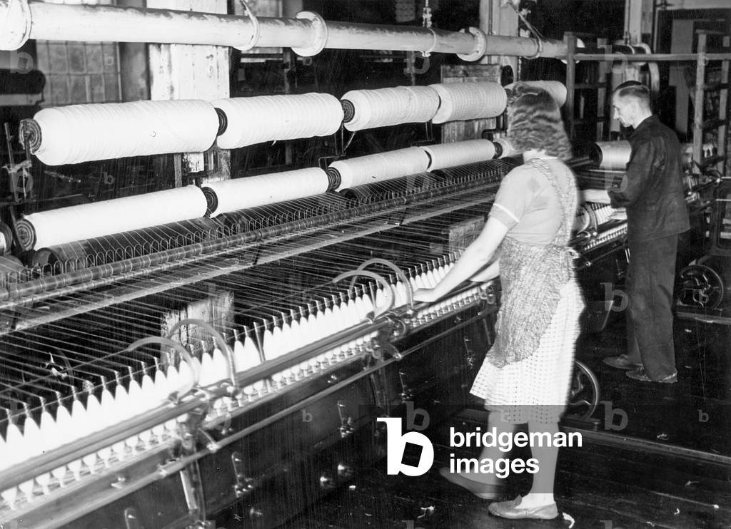 Female worker at a weaving mill, 1941 (b/w photo)