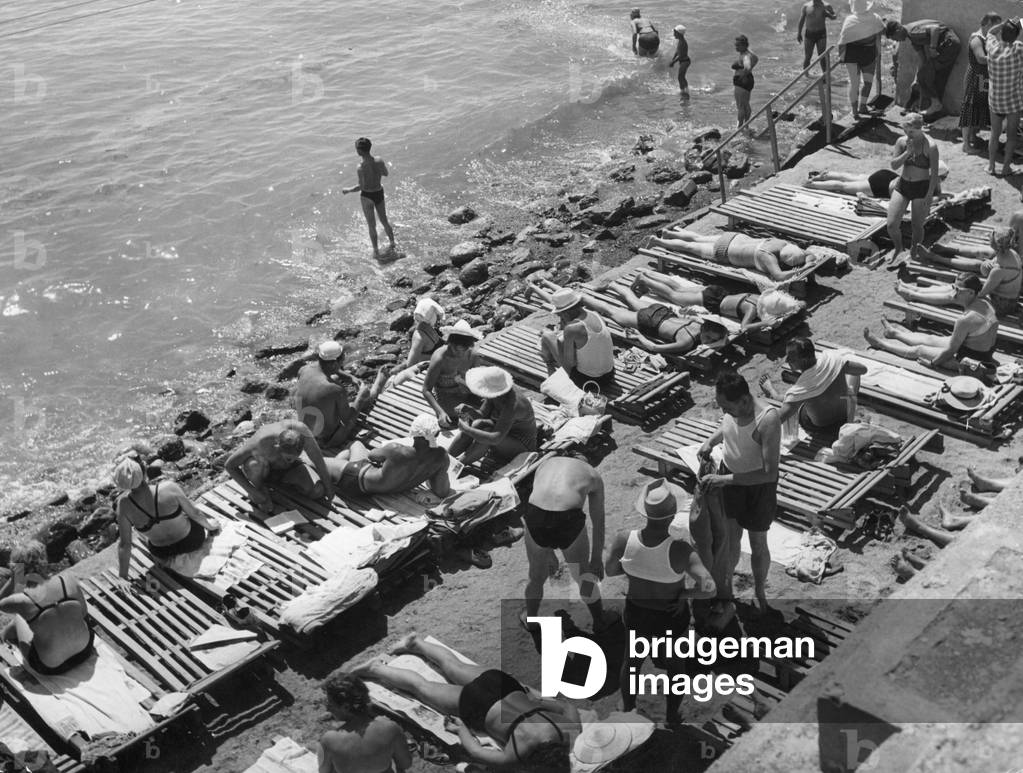 Holidaymakers on the beach in Yalta, 1960 (b/w photo)