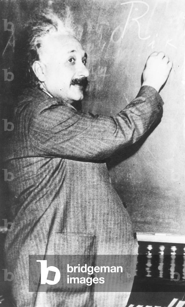 Albert Einstein at the blackboard, USA, c.1930-39 (b/w photo)