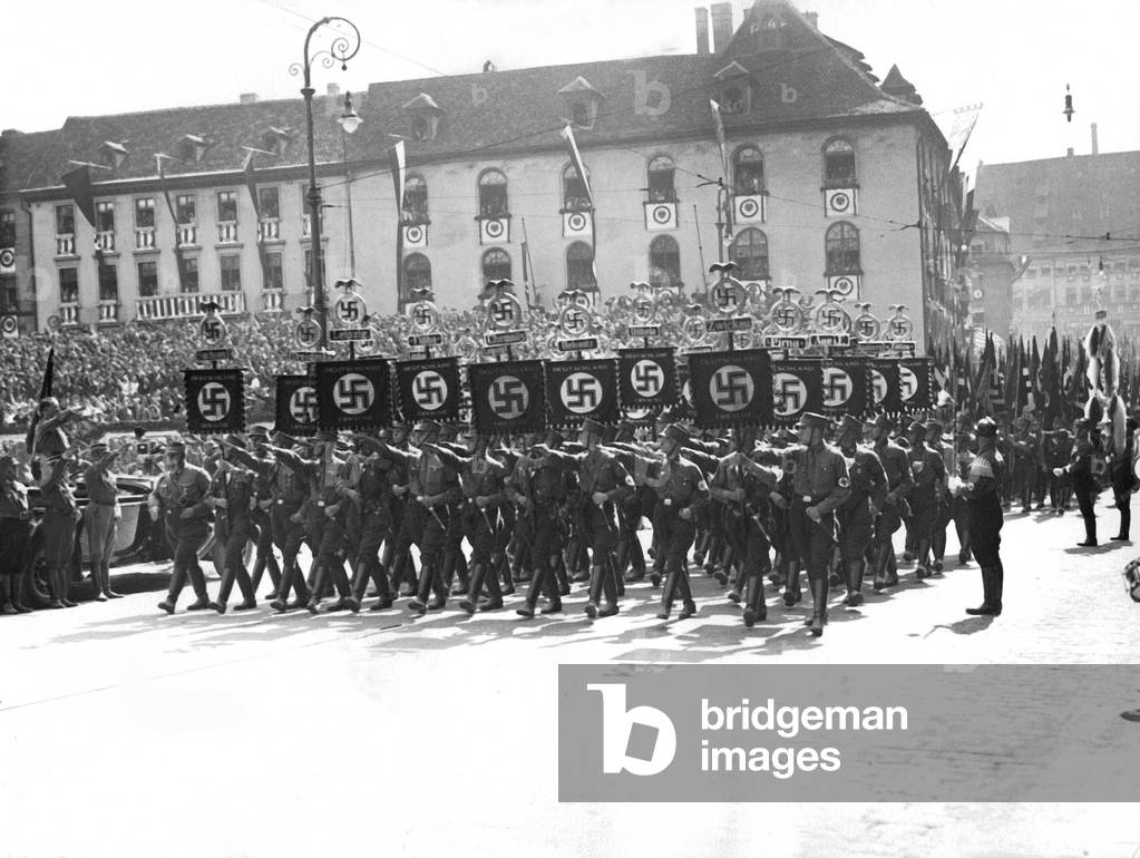 SA-Flag Bearers parading for Adolf Hitler in Nuernberger City center, 1934 (b/w photo)