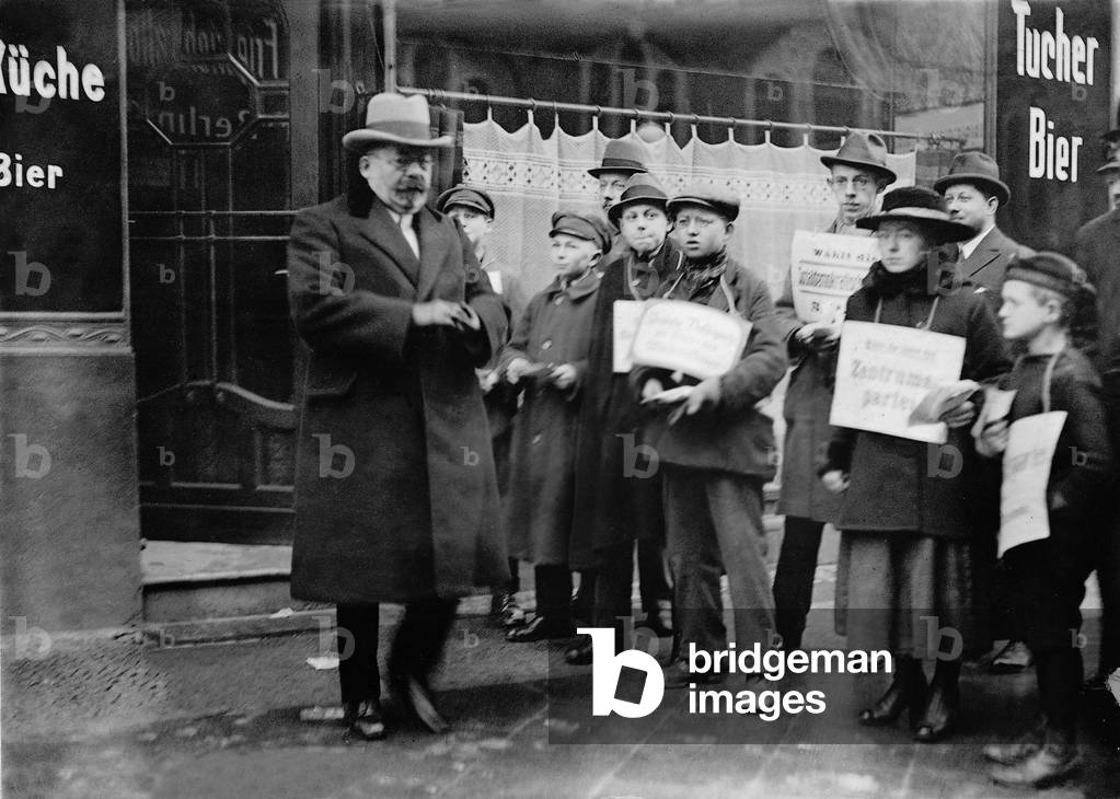 Friedrich Ebert leaves a polling station in Berlin, 1921 (b/w photo)