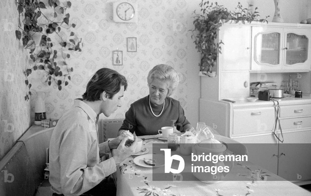 At the breakfast table, 1971 (b/w photo)