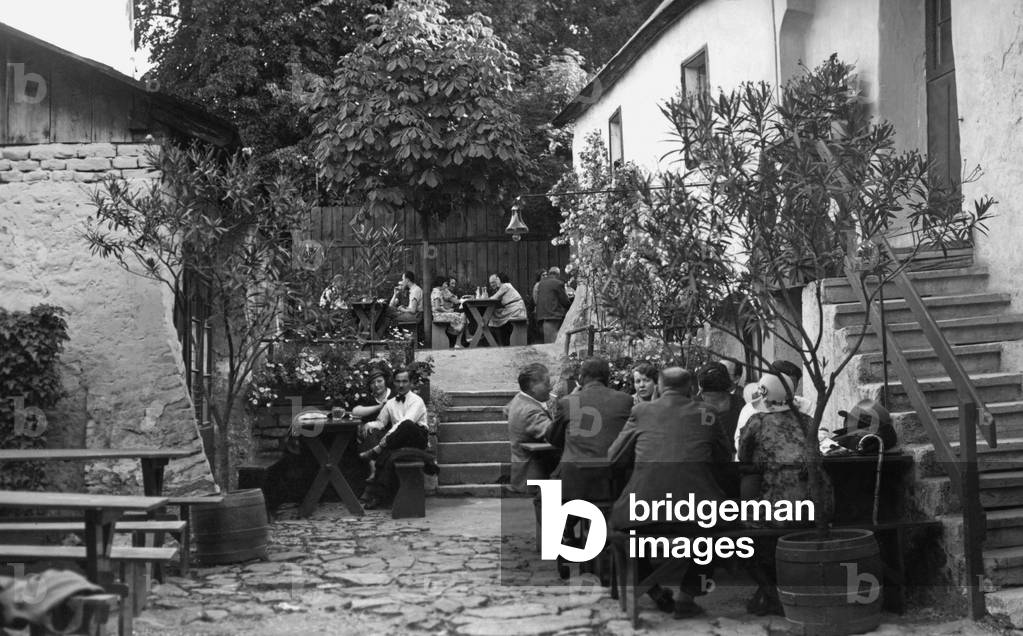 Heuriger (wine tavern) in Vienna, 1938 (b/w photo)