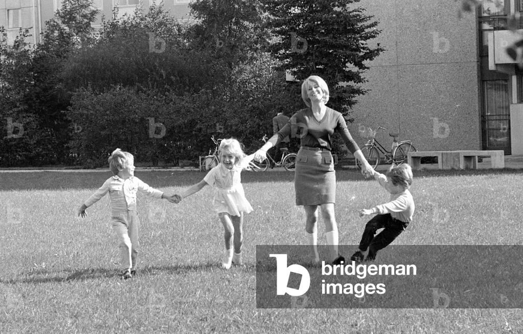 Tommi Ohrner with his siblings and his mother, 1969 (b/w photo)