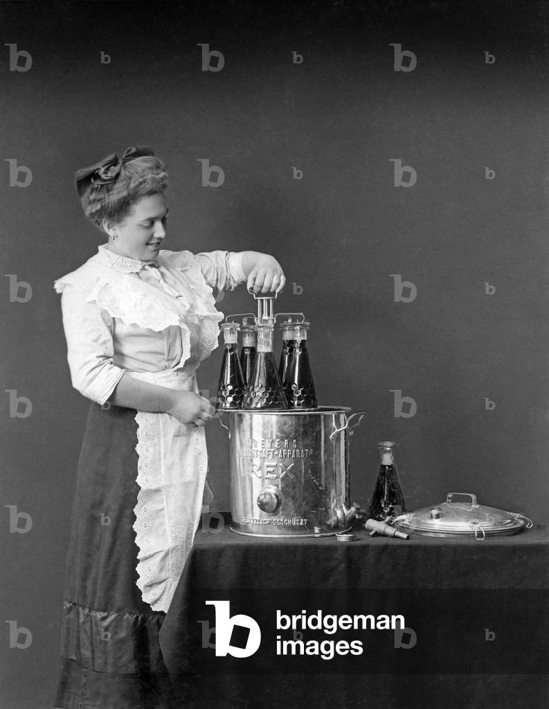 Fruit juice production, 1913 (b/w photo)