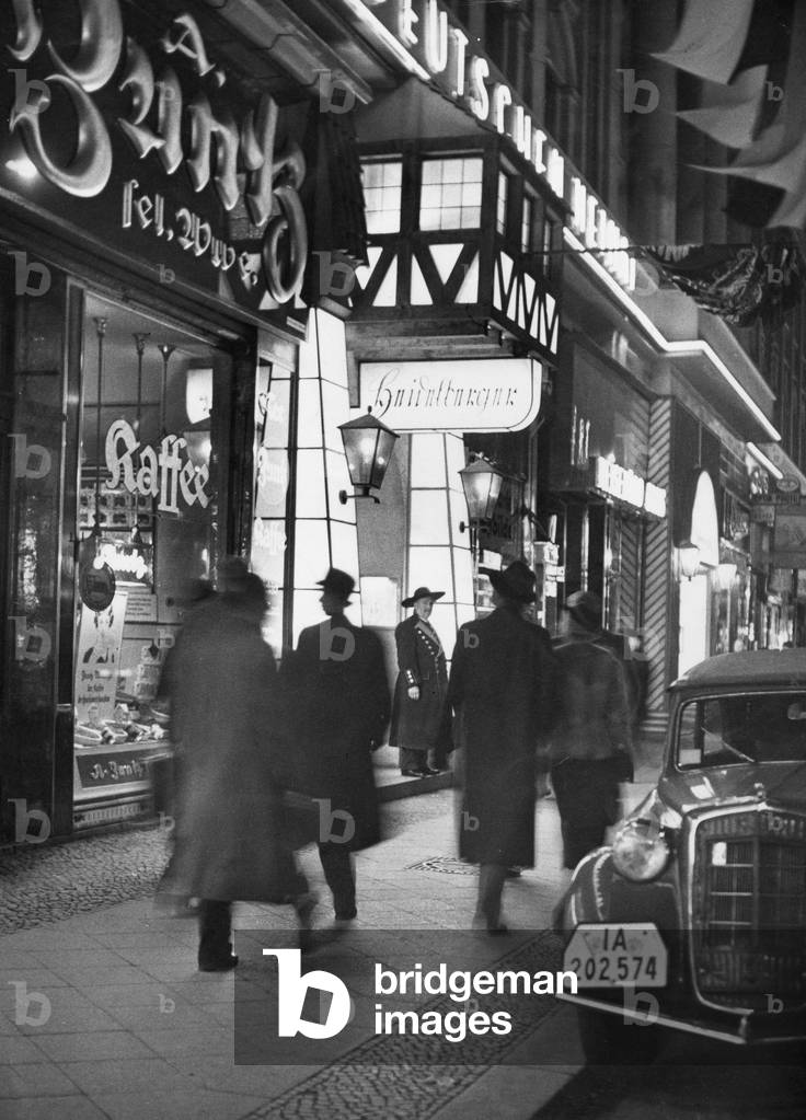 The Friedrichstrasse in Berlin at night, 1935 (b/w photo)