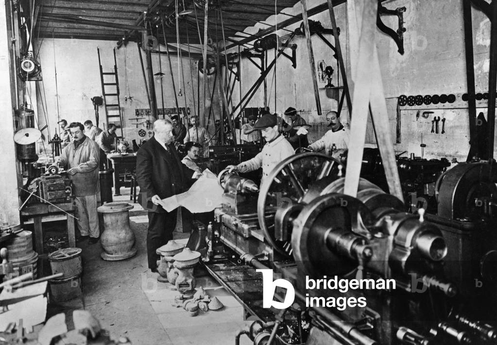 Workers in an iron plant, 1908 (b/w photo)
