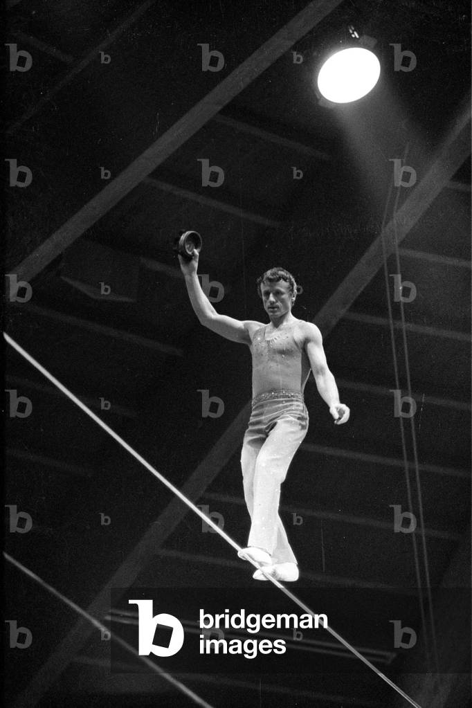 Tightrope artist in the circus, 1974 (b/w photo)