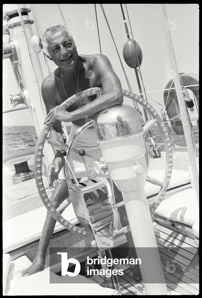 Gianni Agnelli sailing in Corsica, 1975 (b/w photo)