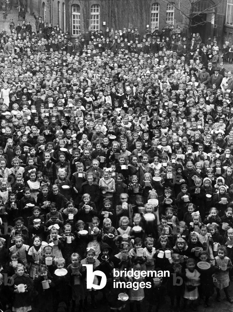 Children are fed in a Berlin school, around 1920