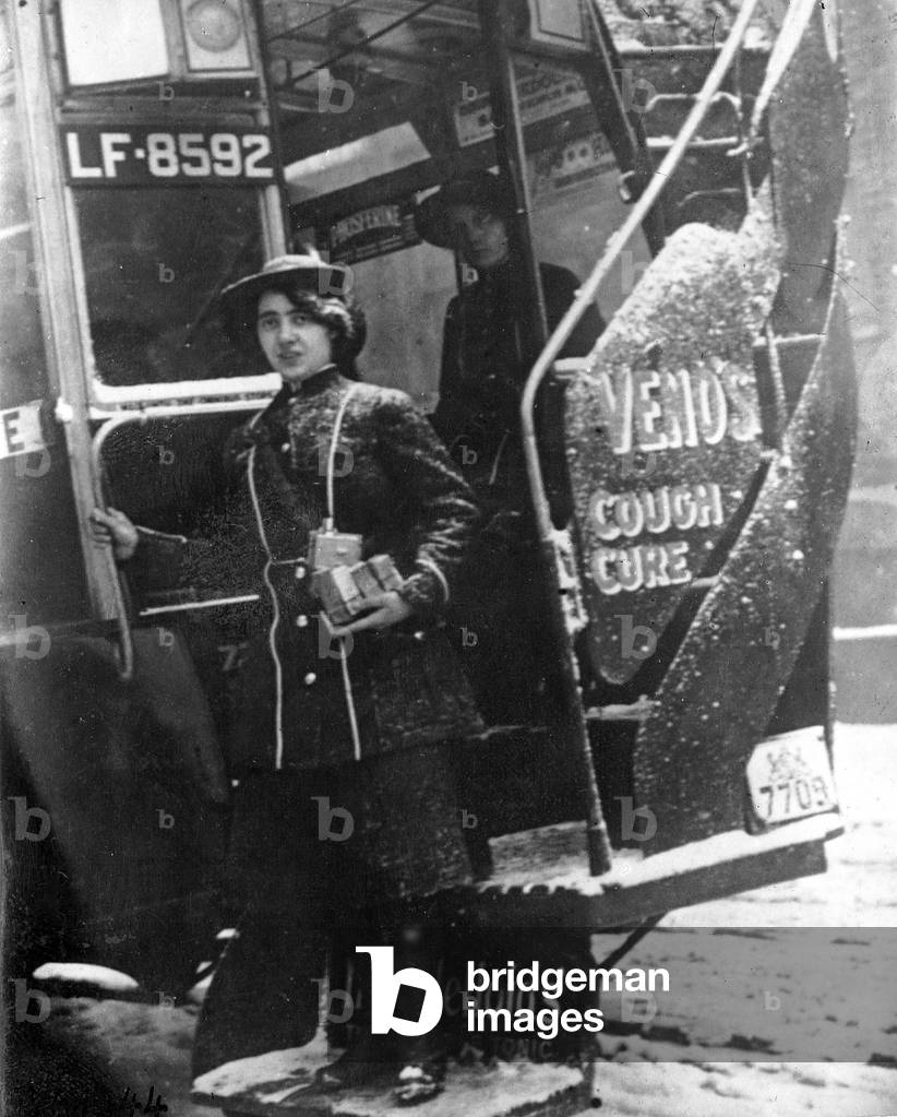 British bus ticket collector, 1916 (b/w photo)