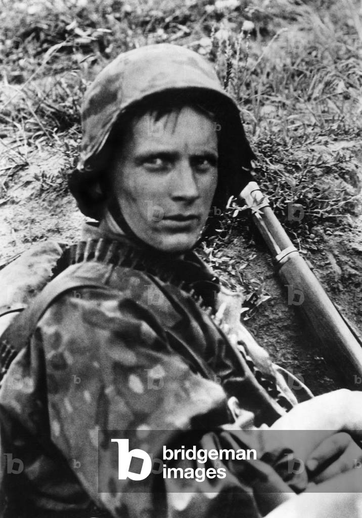 Soldiers of the Waffen SS resting on the Eastern front, 1941 (b/w photo)