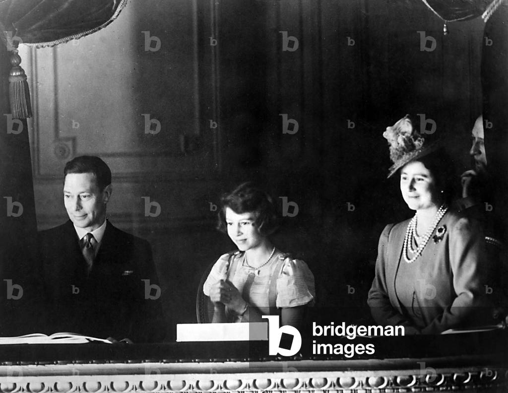 Elizabeth II with her parents at the Coliseum, 1939 (b/w photo)