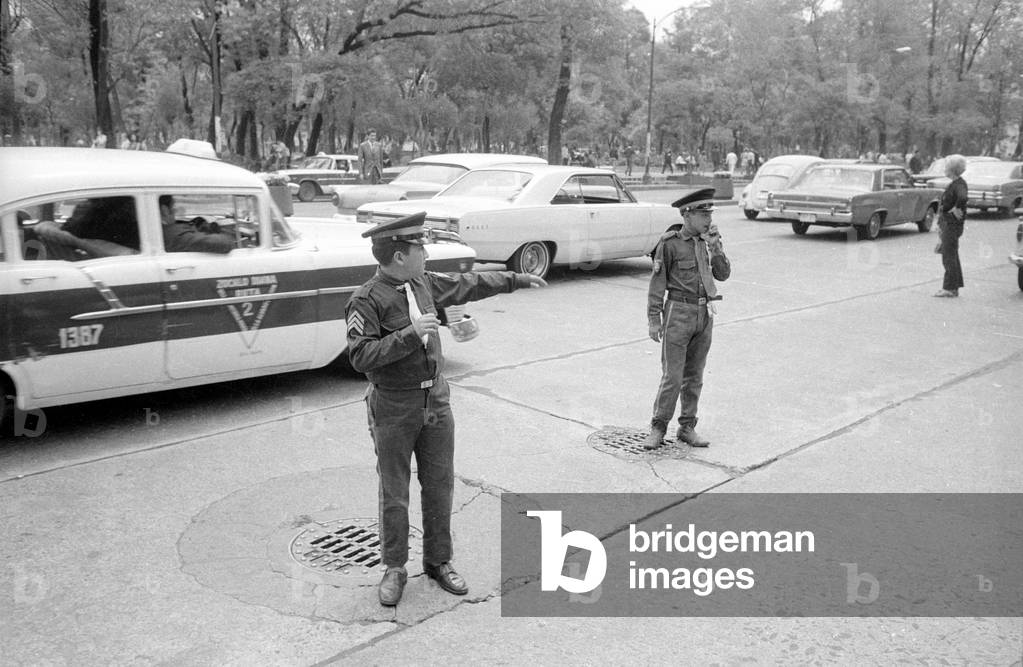 Children as auxiliary policemen directing traffic in Mexico City, 1970 (b/w photo)