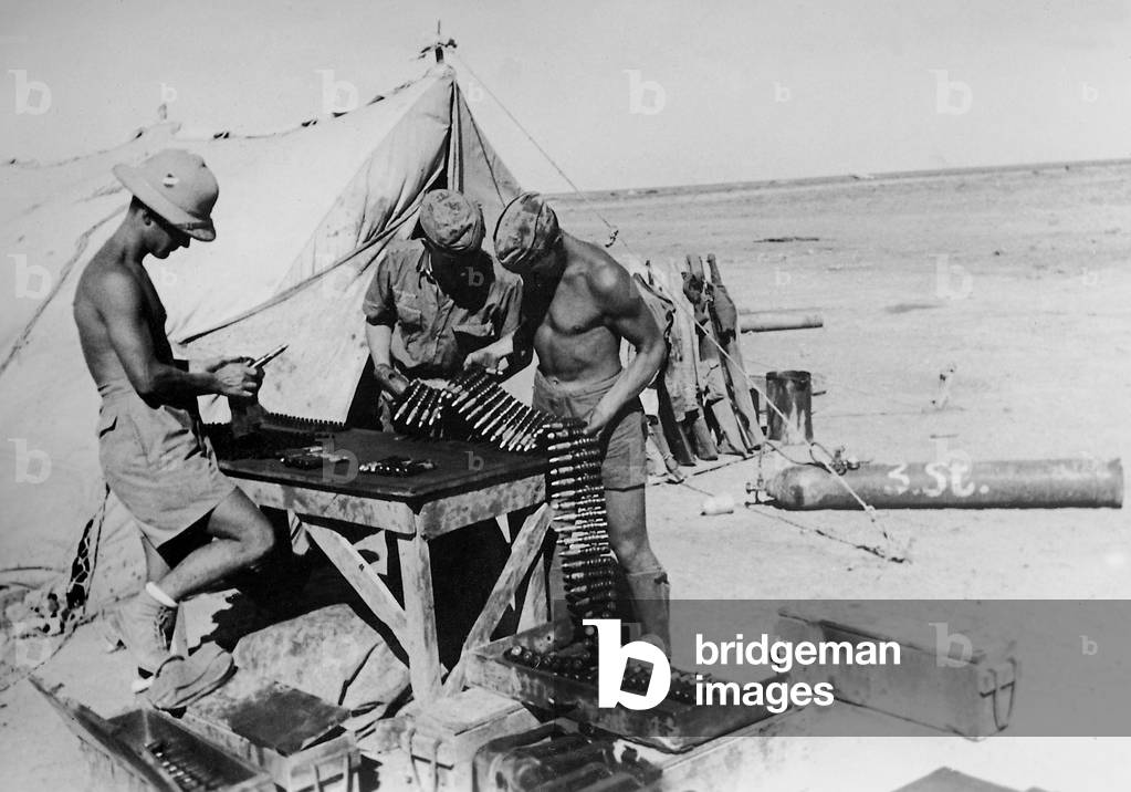 Preparing munitions for fighter planes, 1942 (b/w photo)