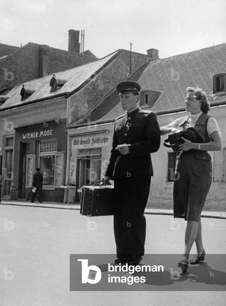 Soviet soldier with escort in the occupied Austria, 1950s (b/w photo)