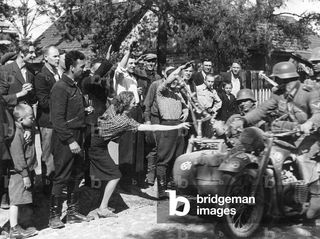 Soldiers of the 12th SS Panzer Division being welcomed by crowds during the advance in Yugoslavia, 1941 (b/w photo)