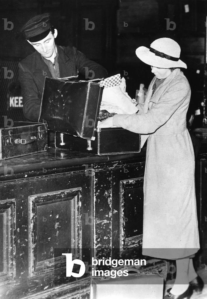 Luggage check at the railway station, 1939 (b/w photo)