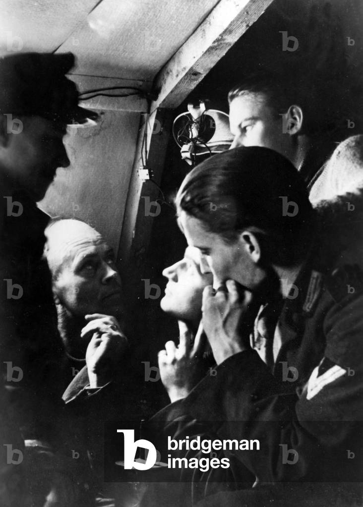 Soldiers listening to a Wehrmacht report in Norway, 1945