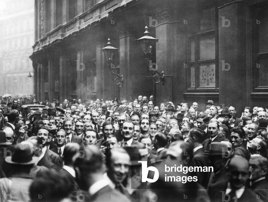 People waiting for news at the London Stock Exchange, 1931 (b/w photo)