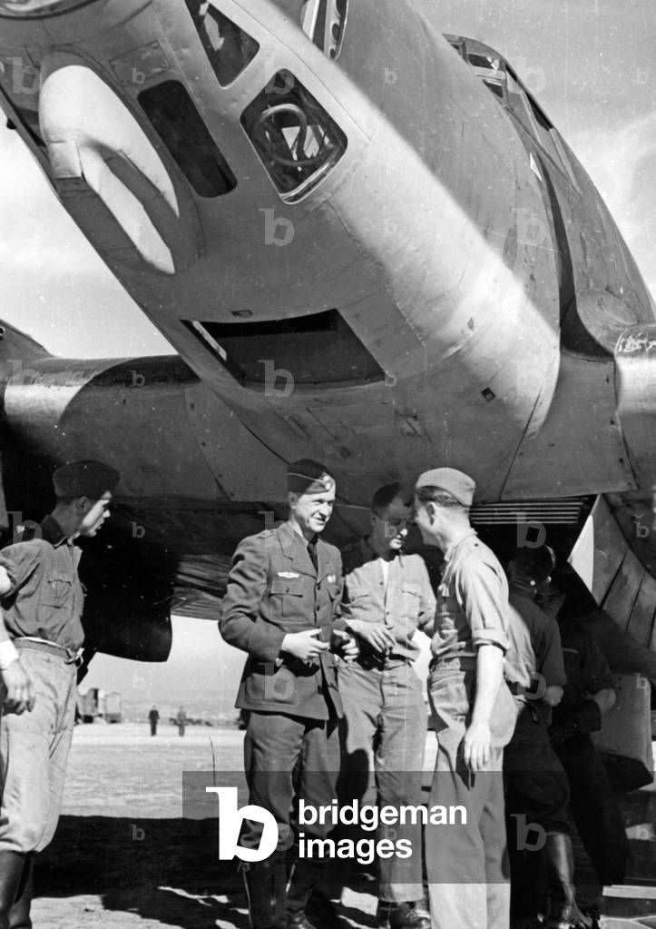 Pilot of the Condor Legion in conversation with the ground personnel, Spain, 1939
