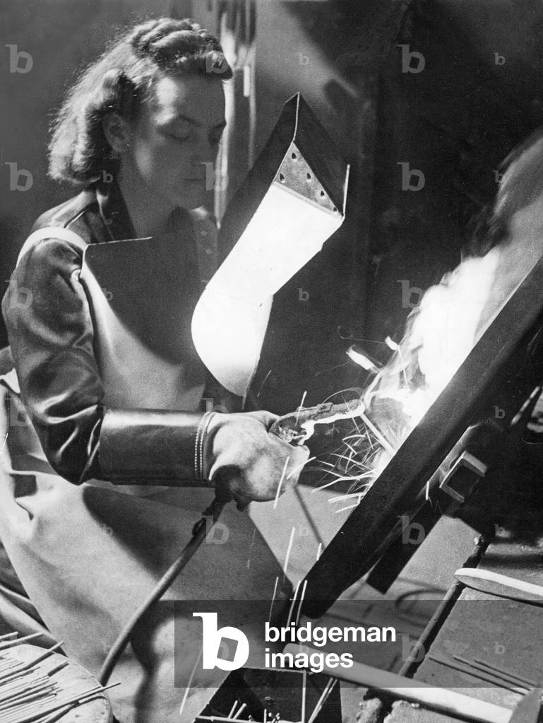 Woman in the armaments industry, 1940 (b/w photo)