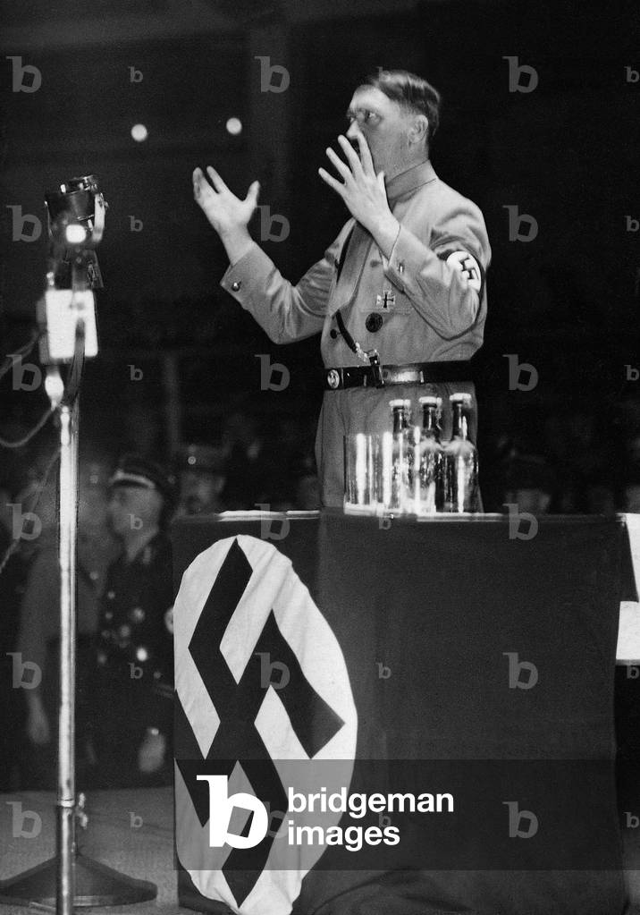 Adolf Hitler during a speech, 1933 (b/w photo)
