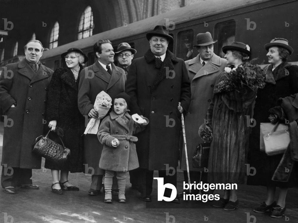 Hilde Koerber, Emil Jannings and his wife Gussy Holl at the Anhalter-station, 1937 (b/w photo)