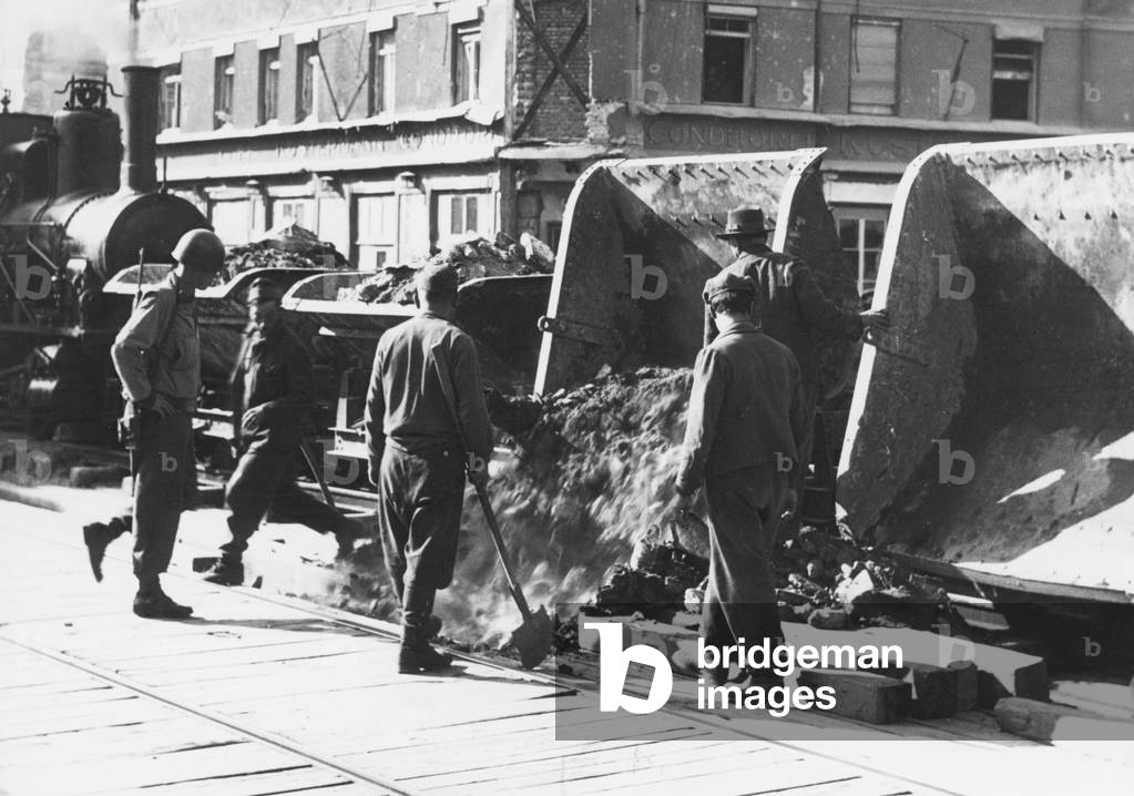 War prisoners at rubble clearance work in Munich, 1945