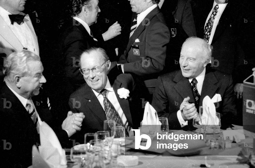 Alfons Goppel, Bernhard zur Lippe-Biestfeld and Walter Scheel at the celebration of the World Cup victory in Munich, 1974 (b/w photo)