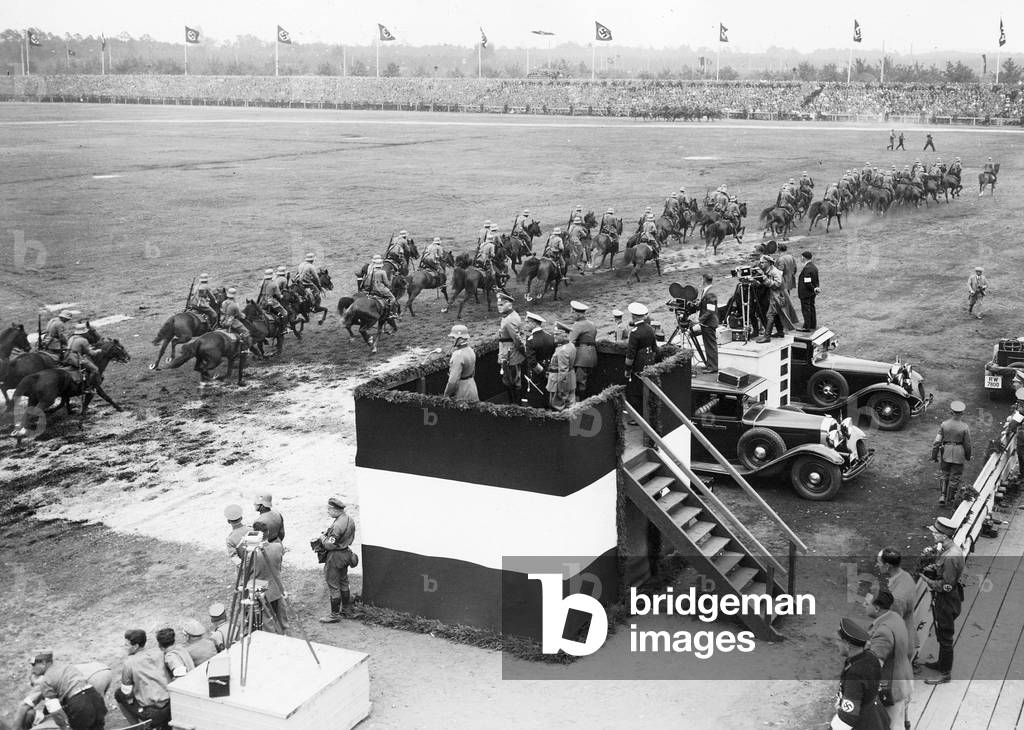 Performance of a cavalry regiment in Nuremberg, 1934 (b/w photo)