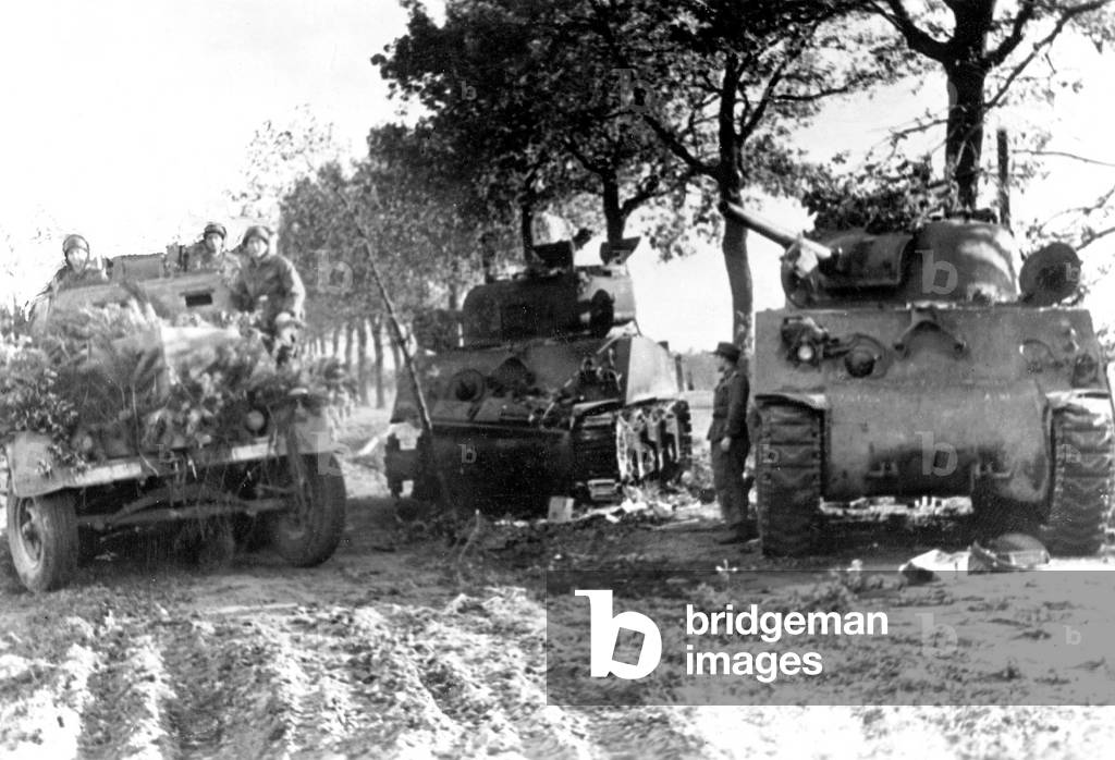 German infantry fighting vehicle during fights in France, 1944 (b/w photo)