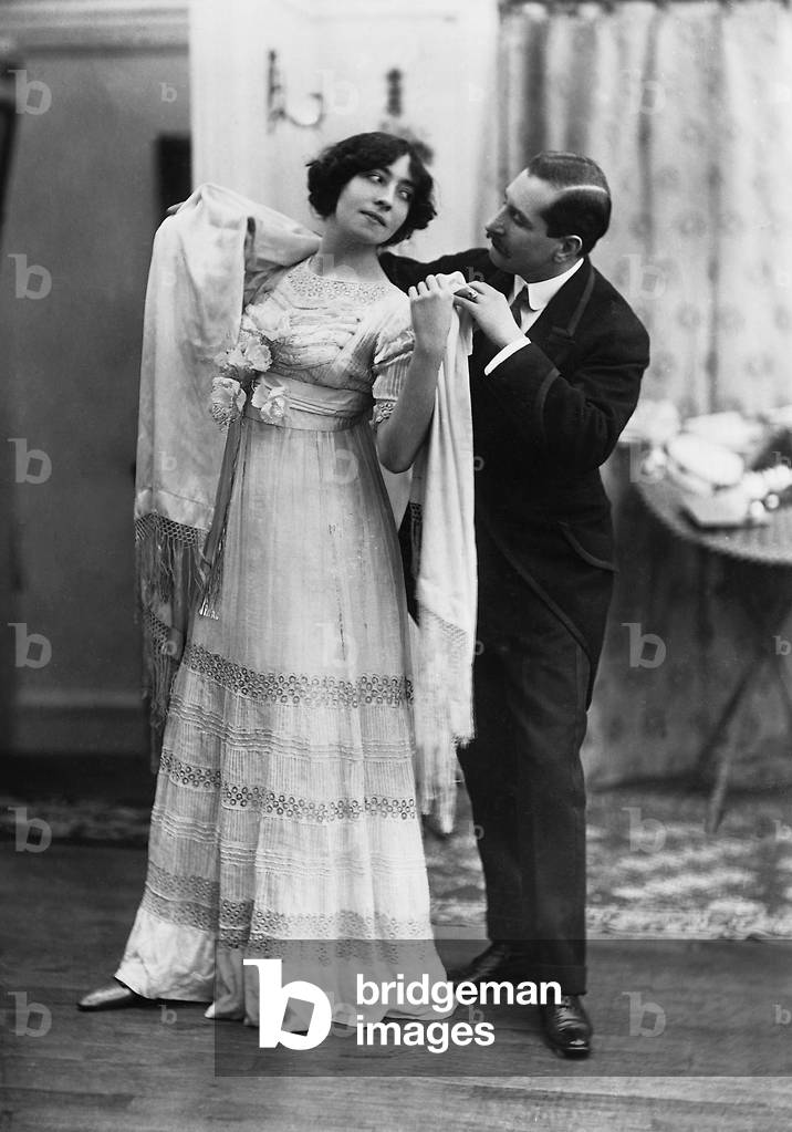Couple dances cotillion, 1909 (b/w photo)