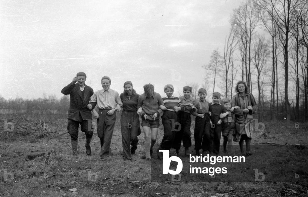 Refugee family in their home near Muenster, 1959 (b/w photo)