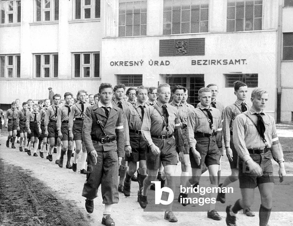 Hitler Youth march through Spis, 1939 (b/w photo)