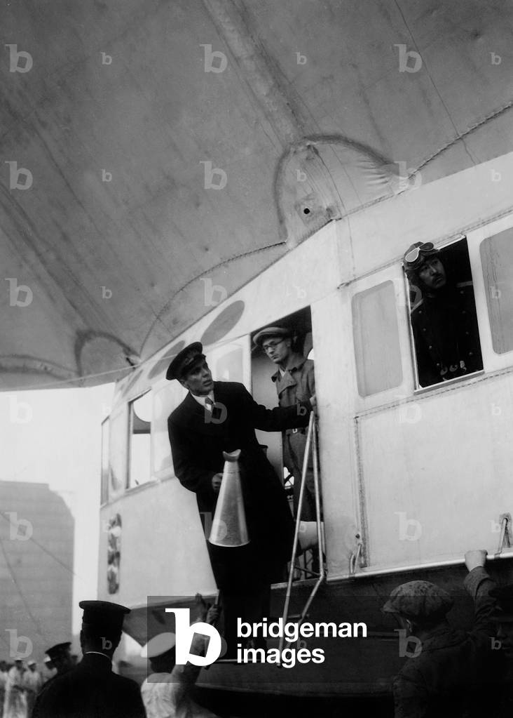 Umberto Nobile climbs in an airship , 1927 (b/w photo)