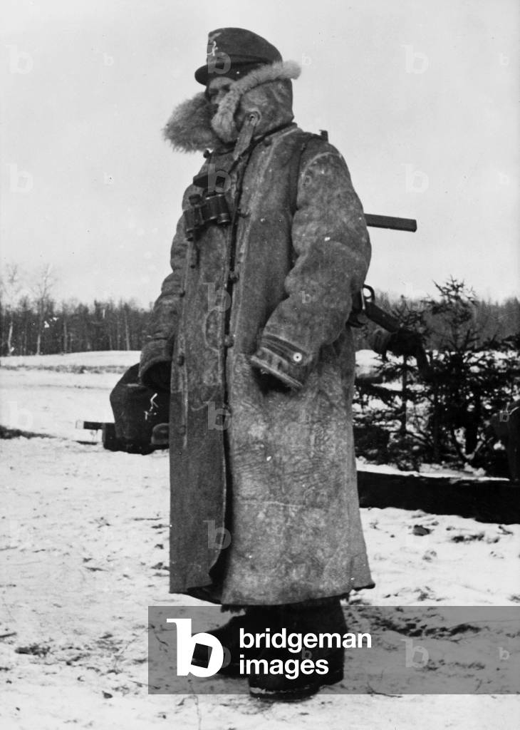 German paratrooper on guard on the Eastern front, 1942 (b/w photo)