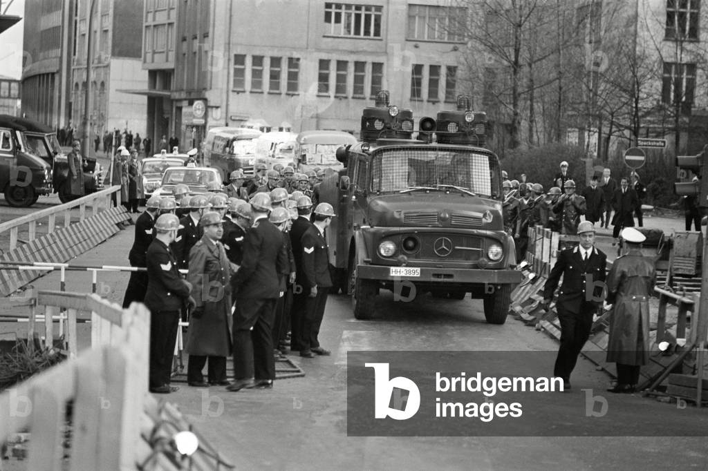 Delivery vans of Axel Springer under police protection in Hamburg, 1968 (b/w photo)