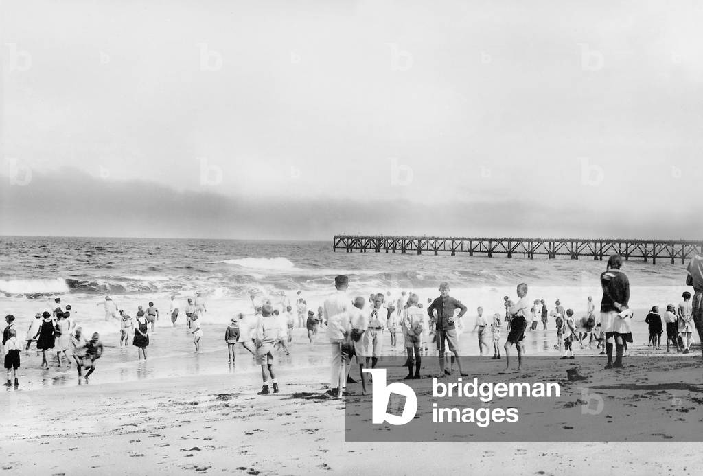 Children on the beach in Swakopmund, 1938 (b/w photo)