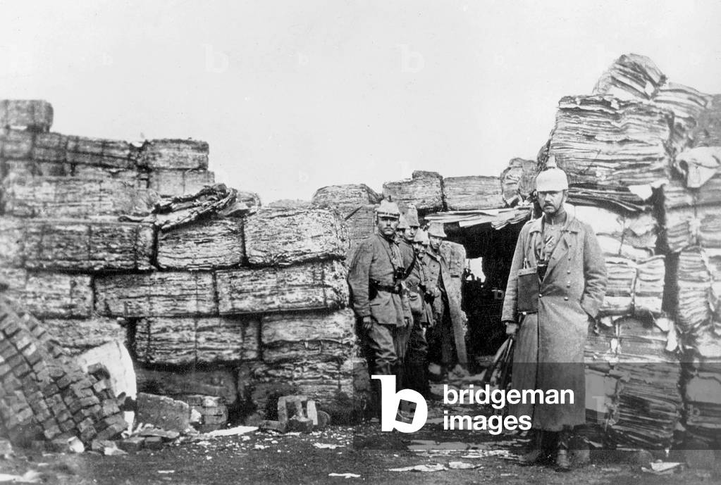 German soldiers in a position built out of paper bales, 1915 (b/w photo)