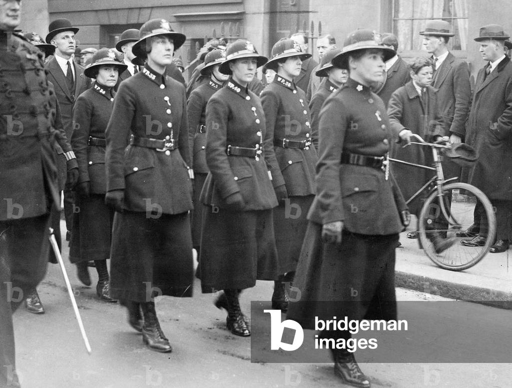 Female police officers from London during a funeral procession, 1927 (b/w photo)