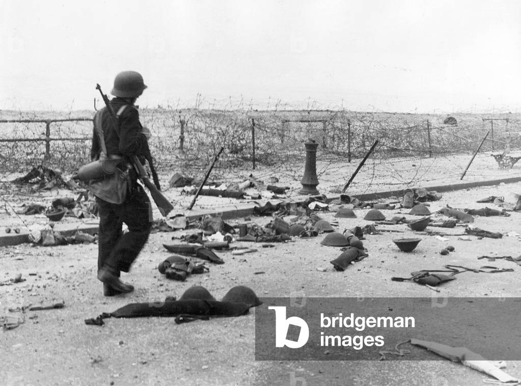 German soldier on the beach at Dunkirk, 1940 (b/w photo)