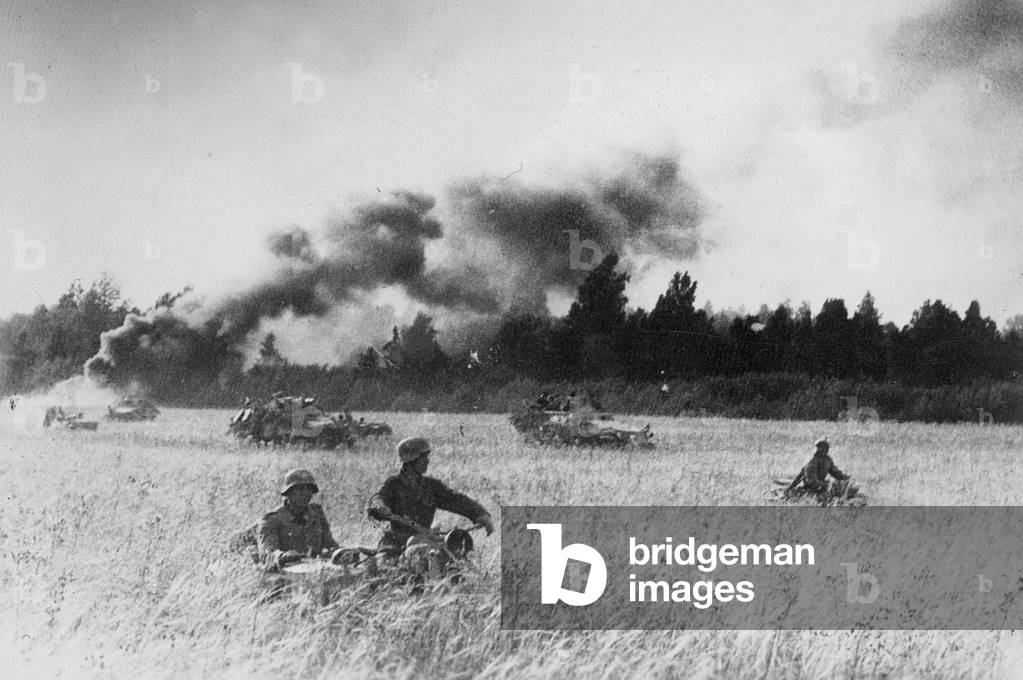 German motorcycle gunners and armored fighting vehicles, 1944 (b/w photo)