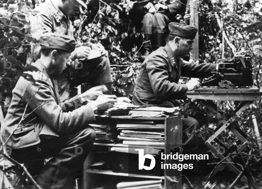 Orderly room of a Luftwaffe unit in the bushes, 1944 (b/w photo)