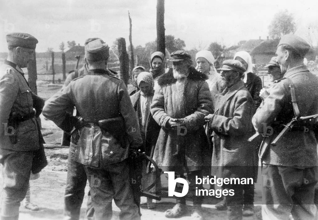 German police interrogate villagers on the Eastern front, 1943 (b/w photo)