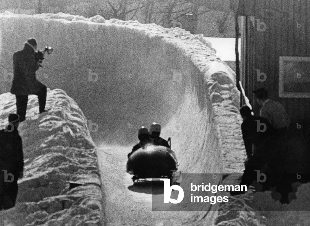 Scene from the two-man bobsleigh competition at the Winter Olympic Games, 1956 (b/w photo)