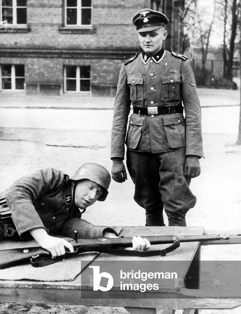 Recruit of the SS Bodyguard Regiment 'Adolf Hitler' in training, 1938 (b/w photo)